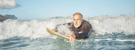 old man surfing